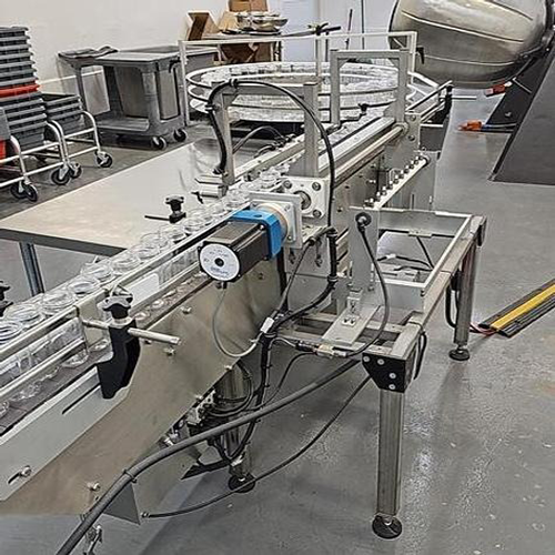 INLINE PACKAGING SYSTEMS RSC Air Rinser and Indexing Conveyor